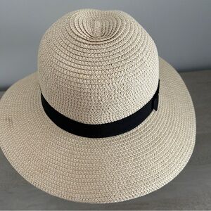 Stylish woven hat with black ribbon trim.  Purchased from LOFT.